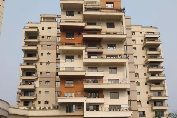 Front-facing view of Infinity Heights showing its geometric, multi-level architectural design.